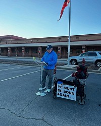 Seasoned evangelist Stirling Long preaching at Unseen Hands in November 2024